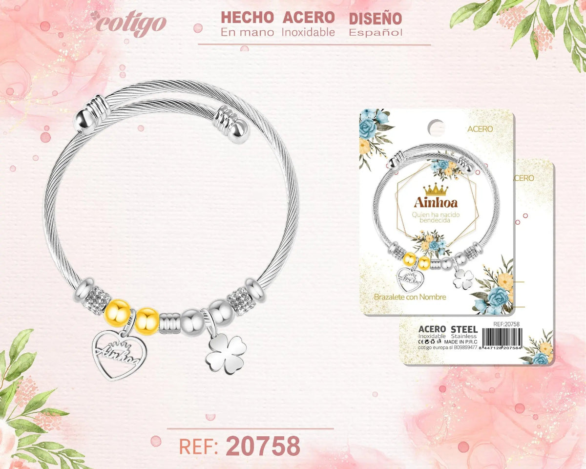 Brazalete rígido de acero inoxidable estilo cable trenzado con el nombre Ainhoa, colgante de corazón, trébol de la suerte y detalles brillantes.
