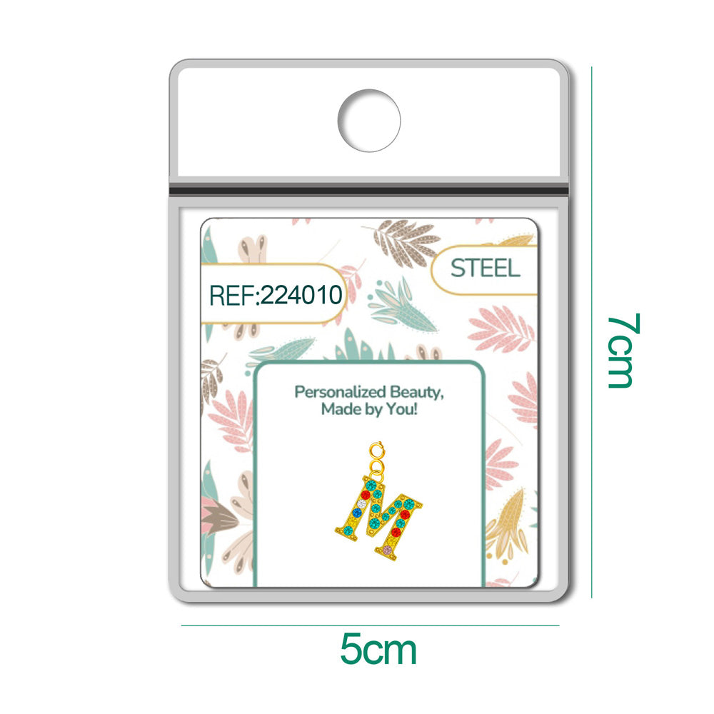 CHARM de Letra M Acero color Dorado con Circonita-con Cierre