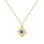 Collar de acero inoxidable dorado con colgante del Nudo de Bruja y detalle central de Ojo Turco azul. Amuleto de doble protección contra el mal de ojo.