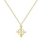 Collar de acero inoxidable con acabado dorado y colgante silueta del Nudo de Bruja. Diseño calado, elegante y luminoso.