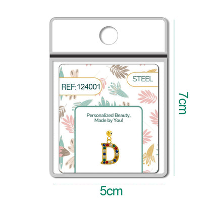 CHARM de Letra D Acero color Dorado con Circonita-con Bola de Goma