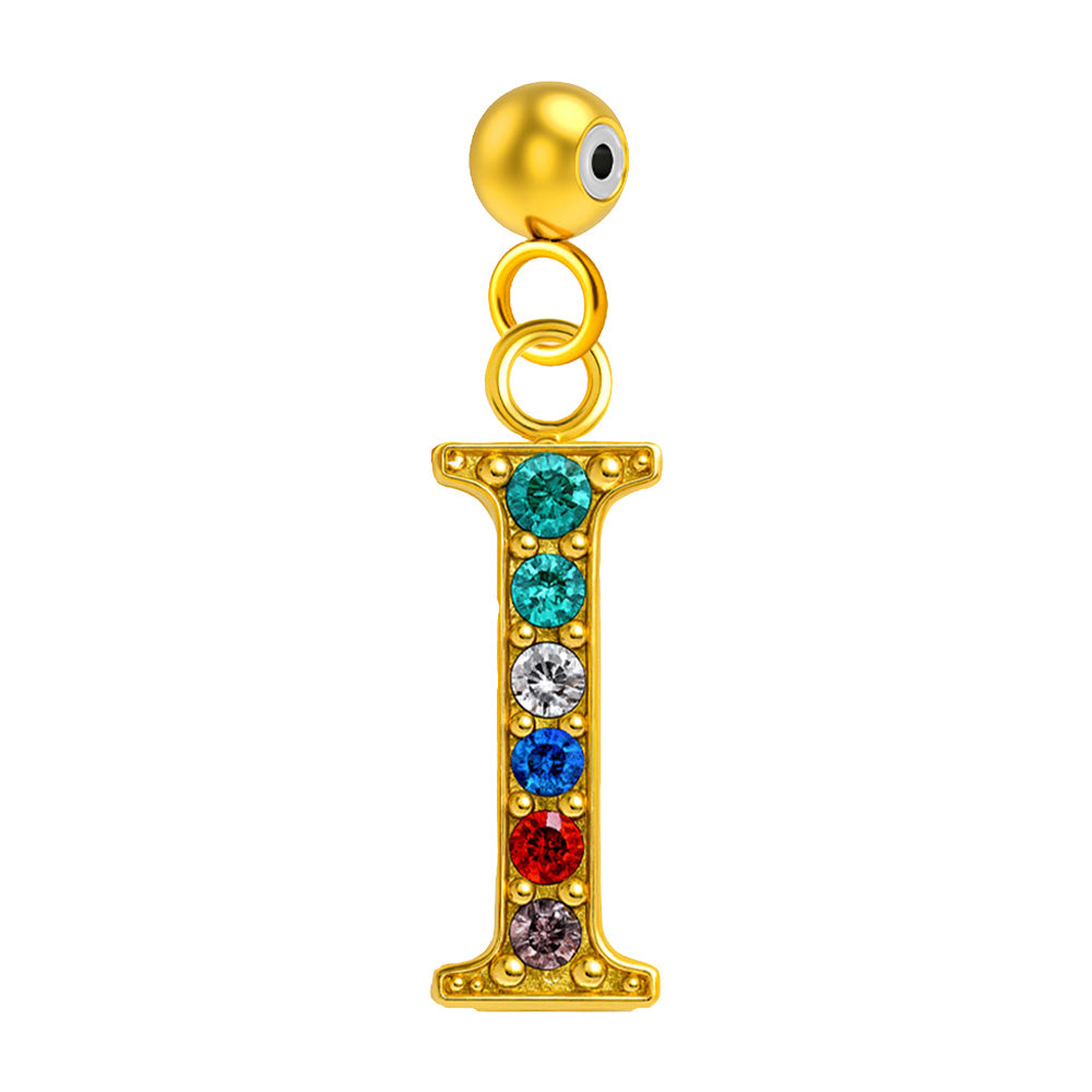 Charm colgante de letra I con detalle de circonita, acabado dorado y bola de acero con goma