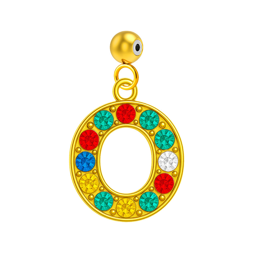 Charm colgante de letra O con detalle de circonita, acabado dorado y bola de acero con goma