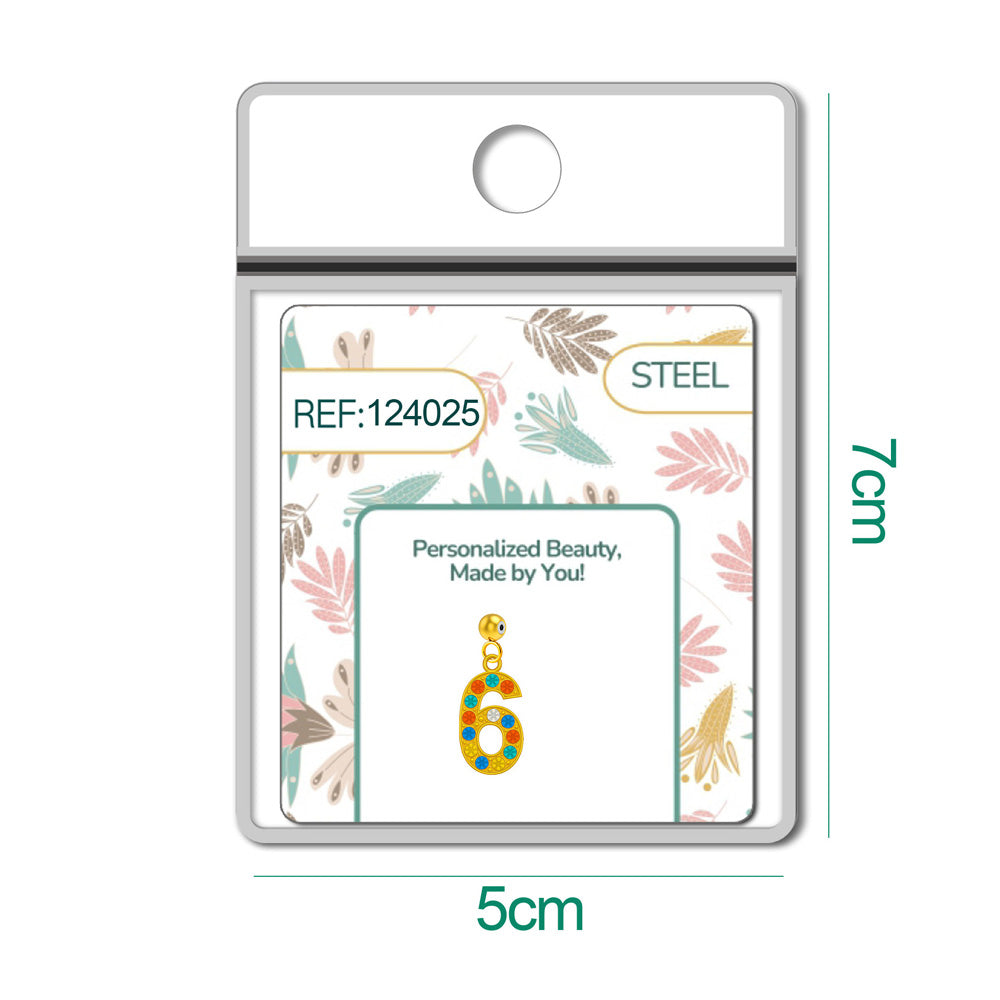 Charm dorado de número 6 con circonitas de colores con bola de acero con goma, en blíster