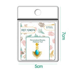 Detalle de charm colgante de sol turquesa con bola de acero con goma