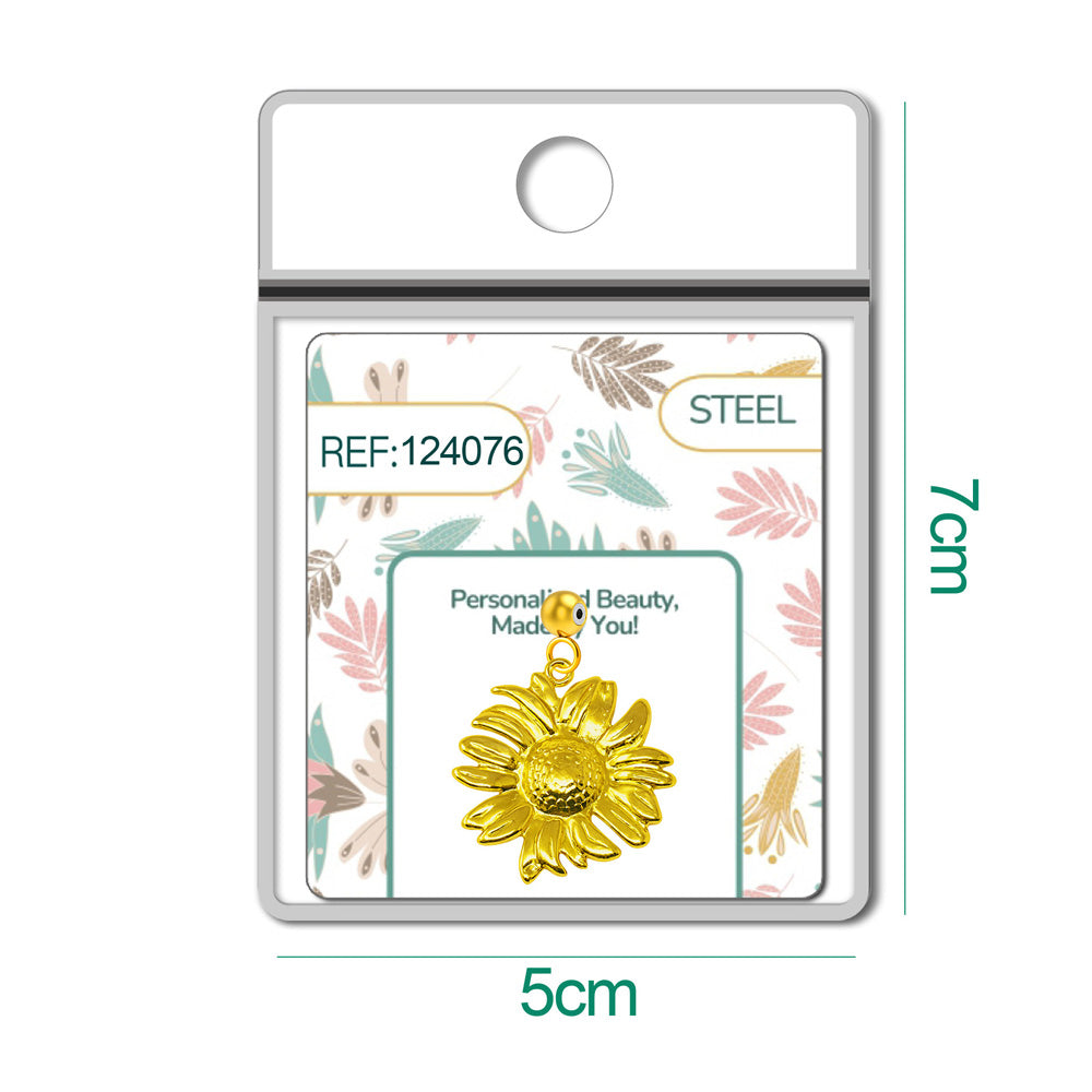 Detalle de charm colgante de girasol con bola de acero con goma