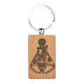 Llavero rectangular de madera natural con grabado oscuro de la Virgen de Covadonga La Santina souvenir religioso