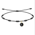 Pulsera negra de 7 nudos con Ojo Turco negro