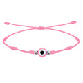 Pulsera rosa de 7 nudos con amuleto central de ojo turco rosa y cuentas plateadas en cordón ajustable.