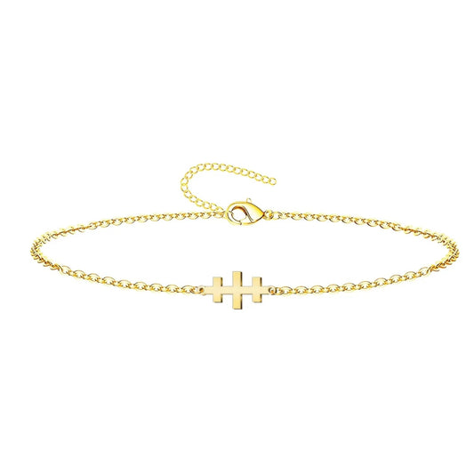 Pulsera de cadena fina en acero inoxidable dorado con Cruz de las Catacumbas horizontal y cierre de mosquetón ajustable.