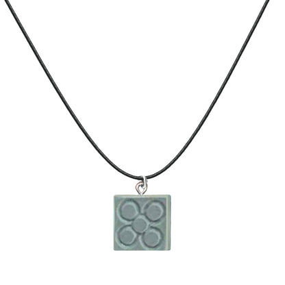 Colgante Flor de Barcelona con cordon y Acero