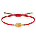 Pulsera de hilo encerado ajustable con medalla de San Cristóbal portando al Niño Jesús, disponible en rojo, amuleto de protección para viajeros y conductores.