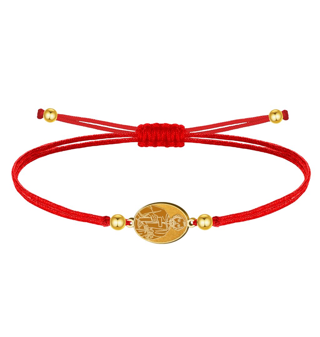 Pulsera de hilo encerado ajustable con medalla de San José Obrero en acero inoxidable. Disponible en hilo rojo con acabado dorado