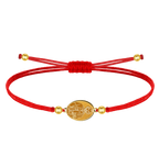 Pulsera de hilo encerado ajustable con medalla de San José Obrero en acero inoxidable. Disponible en hilo rojo con acabado dorado