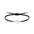 Pulsera de hilo encerado negro con conector Lauburu plateado en acero inoxidable y cuentas de metal, cierre ajustable