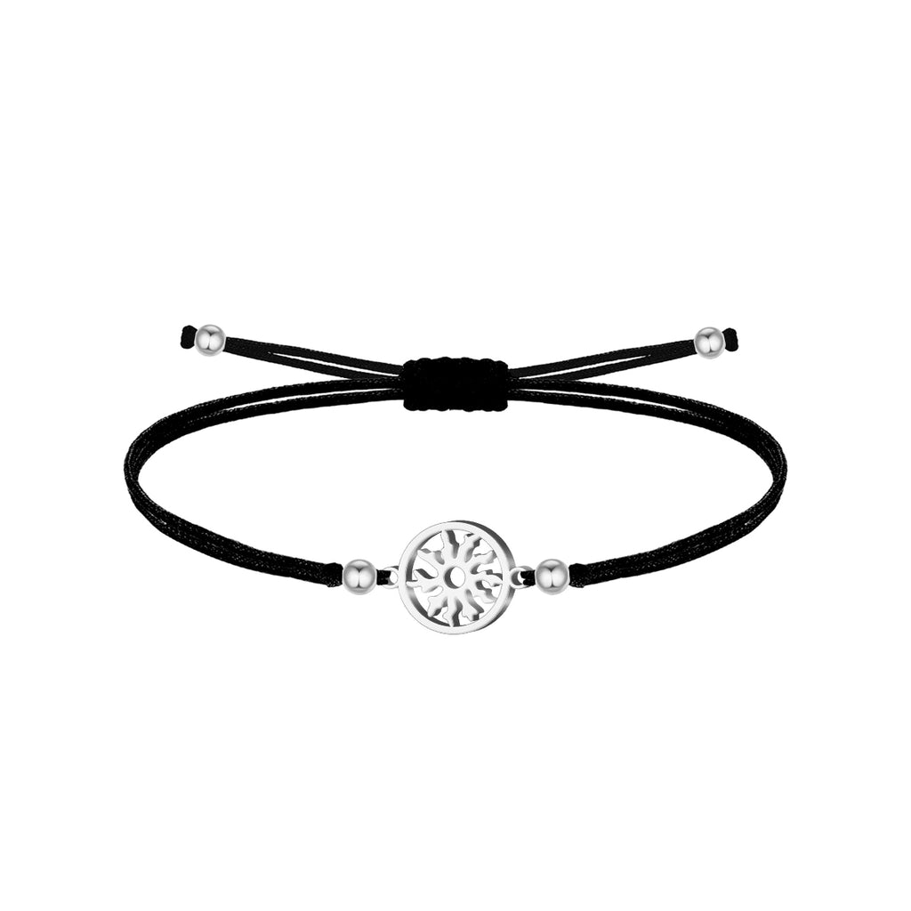 Pulsera de hilo encerado negro con conector de Eguzkilore plateado en acero inoxidable, tarjeta con frase sobre el destino