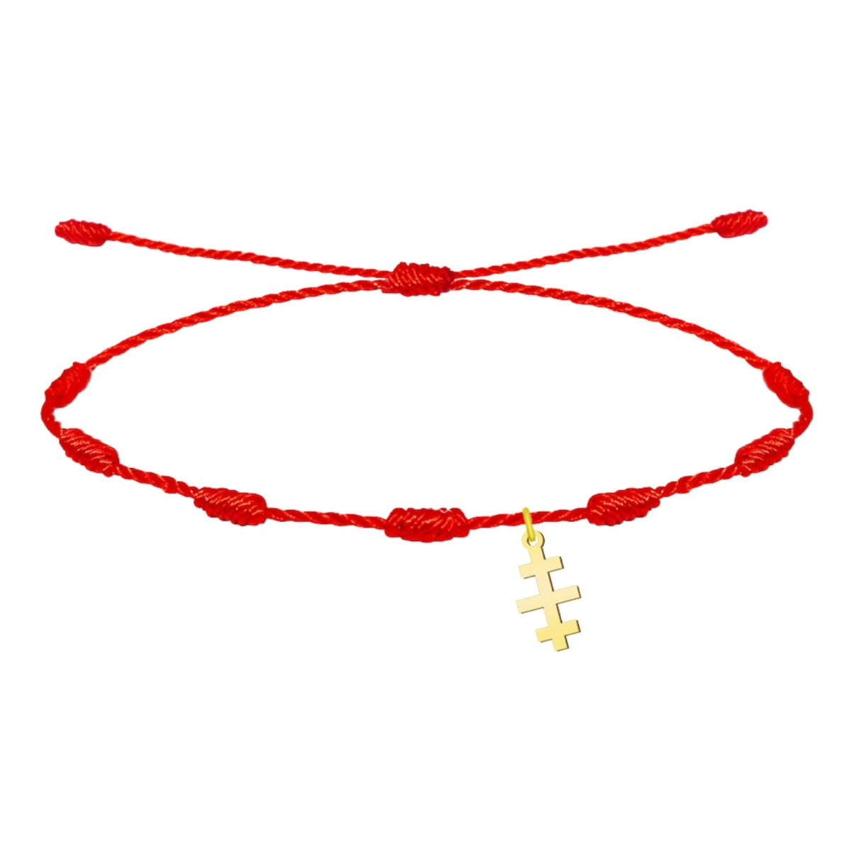 Pulsera de hilo rojo entrelazado con nudos y colgante de Cruz de las Catacumbas en acabado dorado.