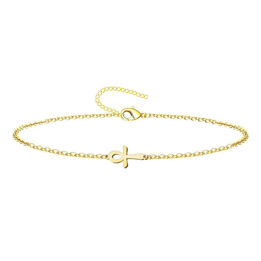 Pulsera de cadena fina con un diseño central de la Cruz Egipcia (Ankh) fabricada en acero inoxidable con acabado dorado brillante y cierre de mosquetón con cadena extensora.