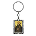 Llavero rectangular de San Benito en metal plateado con imagen a color, amuleto religioso de protección y fe para llevar con las llaves.