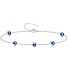 Pulsera de cadena fina plateada con múltiples amuletos de ojo turco azul en acero inoxidable.