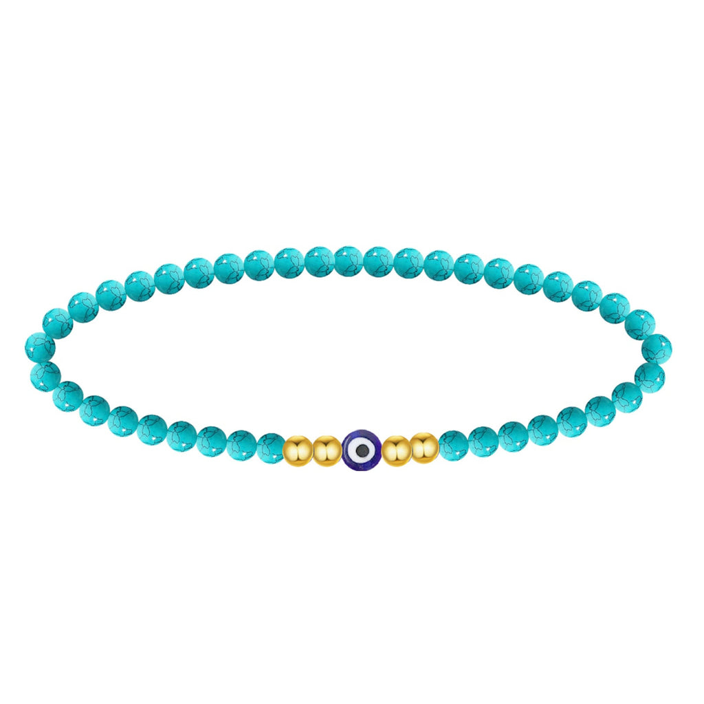 Pulsera de cuentas turquesas con ojo turco central azul y detalles en bolas doradas de acero.