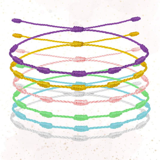 ✨ 6 Pulseras 7 Nudos Hecha a Mano 🌈 Varios Colores con Significado Especial 💫 Incluye Tarjeta Diseñada 🎁 Amuleto de Protección y Suerte 🍀