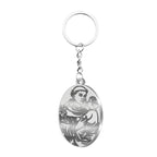 Llavero de San Antonio de Padua en acero inoxidable plateado, medalla ovalada con grabado religioso resistente, ideal para llaves de coche o casa.