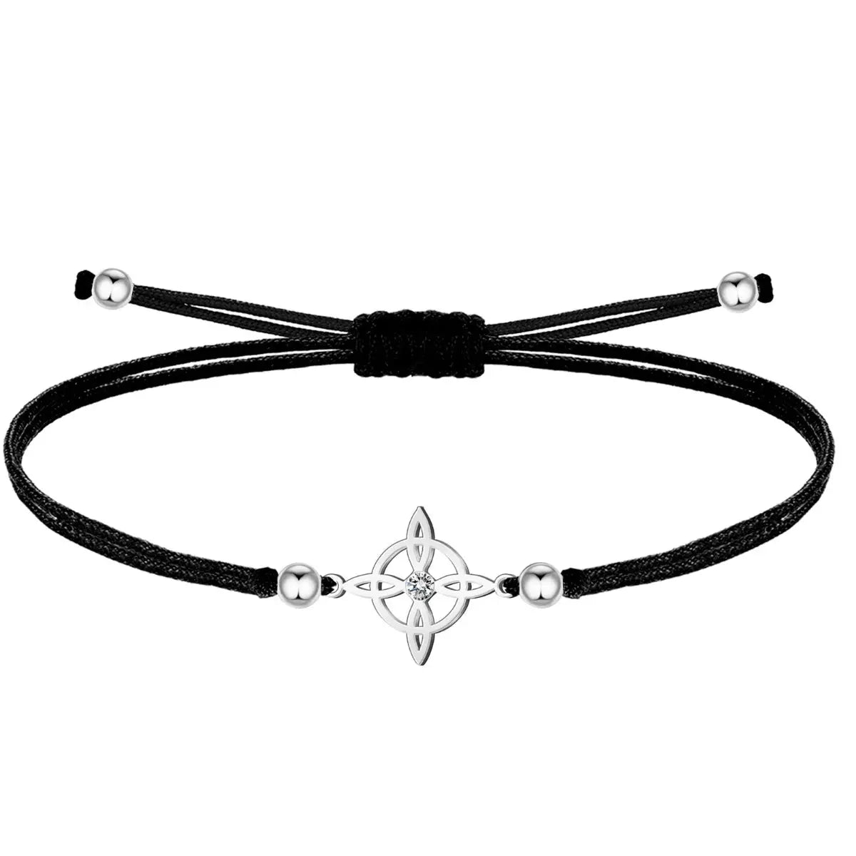 Pulsera de hilo negro encerado con charm del Nudo de Bruja en acero inoxidable plateado y pequeña circonita central, amuleto minimalista.