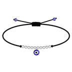 Pulsera de cordón negro con cuentas de acero inoxidable plateadas y un amuleto colgante de ojo turco azul ajustable.