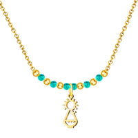 Collar gargantilla con colgante silueta Virgen de Covadonga acero dorado y cuentas color turquesa
