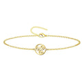 Pulsera religiosa con trisquel dorado en hilo rojo ajustable