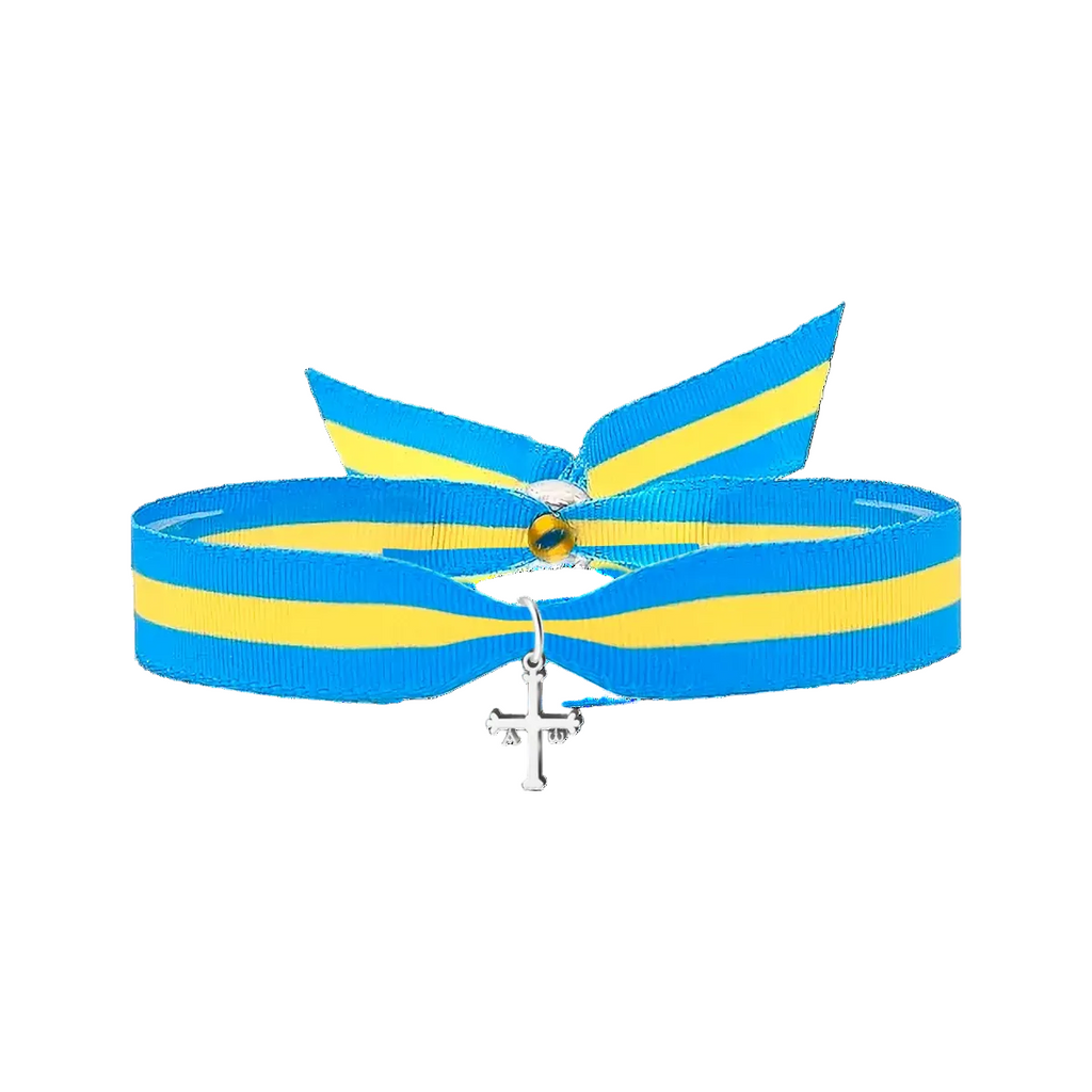 Pulsera de cinta con los colores de la bandera de Asturias y pequeño colgante de la Cruz de la Victoria en acero plateado.