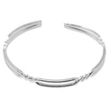 Brazalete Doble Línea Ondulada en Acero Inoxidable en acabado plateado – vista principal del diseño doble línea ondulada