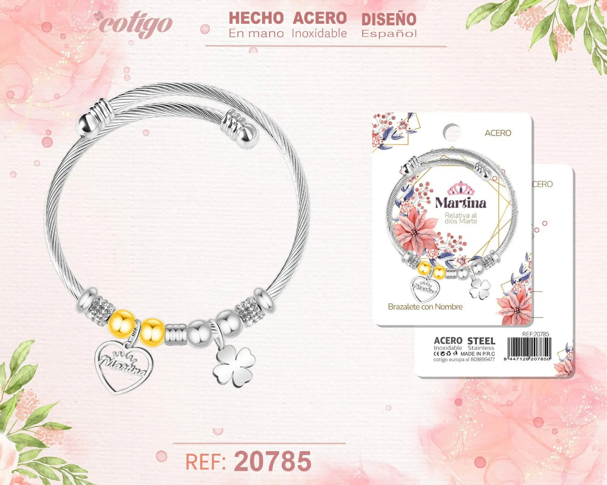 Brazalete rígido de acero inoxidable trenzado con el nombre Martina, colgante de corazón grabado, trébol de la suerte y detalles brillantes.
