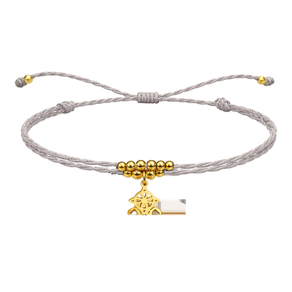 Pulsera Hilo encerado con Colgante Nudo de Bruja en Acero Dorado