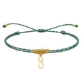 Pulseira de fio encerado com pingente infinito Aço Dourado