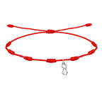 Pulsera roja de los 7 nudos con charm silueta de la Virgen de Covadonga La Santina en acero plateado amuleto de protección