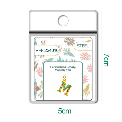 CHARM de Letra M Acero color Dorado con Circonita-con Cierre