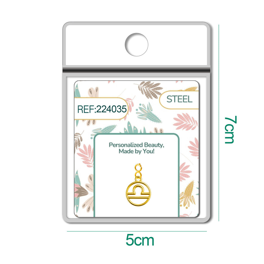 Charm colgante dorado con símbolo de Libra y cierre superior de acero
