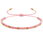Pulsera de Hilo Encerado con Cuentas de Acero Inoxidable en acabado rosa – vista principal