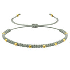 Pulsera de Hilo Encerado con Cuentas de Acero Inoxidable en acabado verde salvia – vista principal