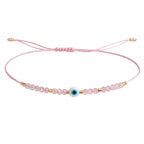 Pulsera de Hilo con Cuentas y Ojo Turco en acabado rosa – vista principal del diseño hilo con cuentas y ojo turco