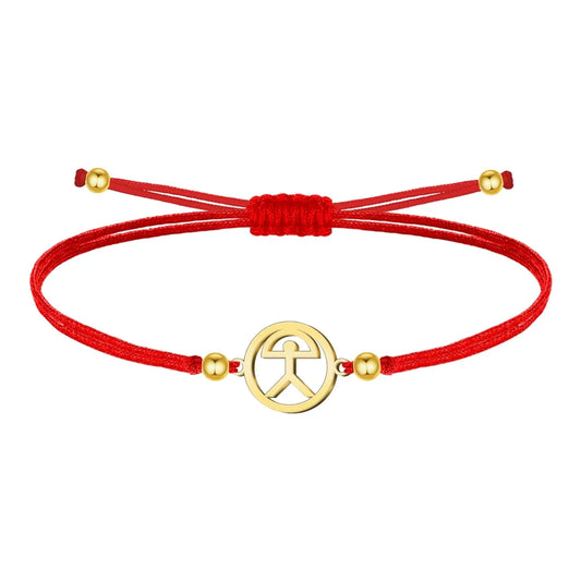 Pulsera de hilo rojo con símbolo Indalo en acero dorado
