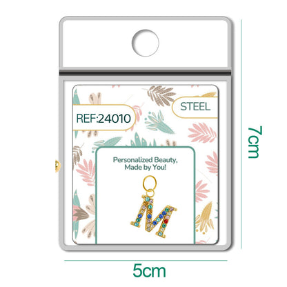 CHARM de Letra M Acero color Dorado con Circonita