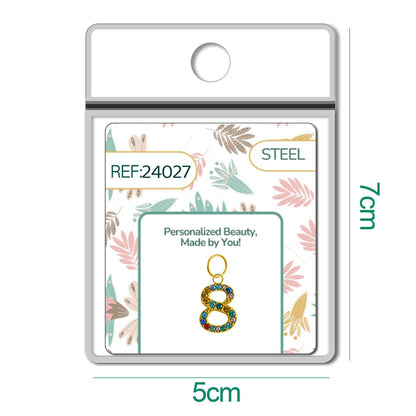 CHARM de Número 8 Acero color Dorado con Circonita