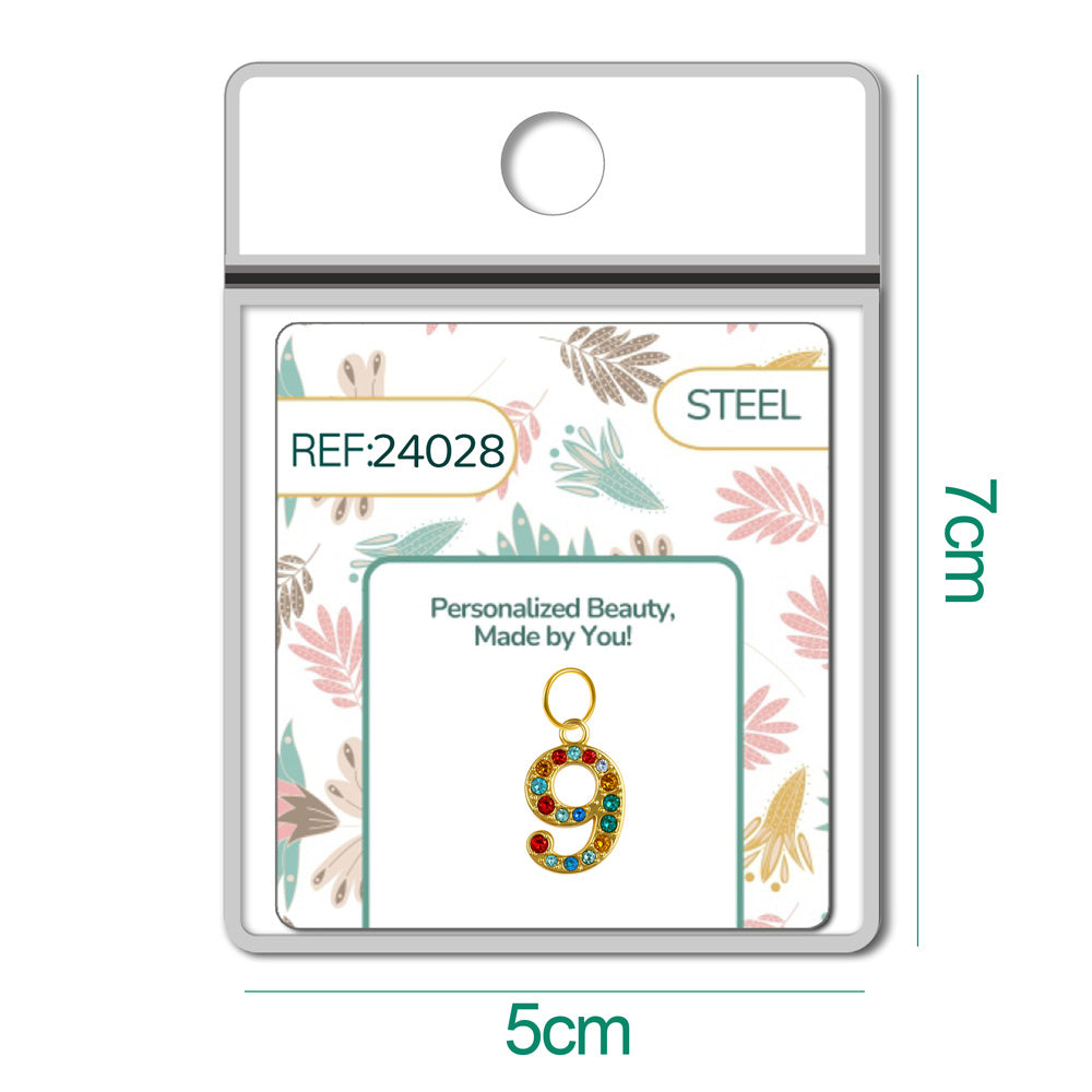 CHARM de Número 9 Acero color Dorado con Circonita