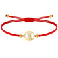 Pulsera de hilo con Virgen de Valvanera en acero y acabado dorado