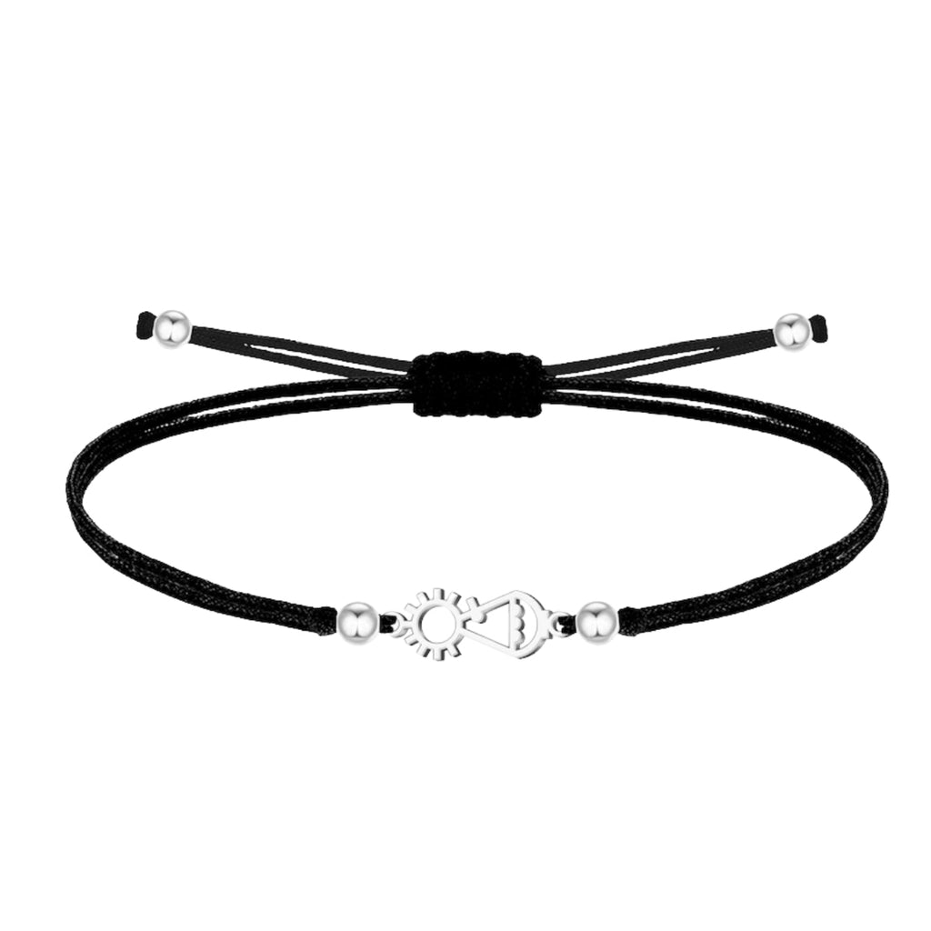 Pulsera de hilo negro con silueta de la Virgen de Covadonga La Santina en acero plateado
