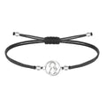 Pulsera de hilo encerado negro ajustable con conector central de la silueta de la Virgen del Pino en acero inoxidable plateado