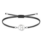 Pulsera de hilo encerado negro ajustable con conector central de la silueta de la Virgen del Pino en acero inoxidable plateado